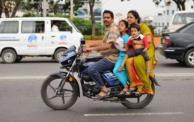 Indian family on motorcycle